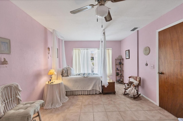 bedroom with light tile patterned floors and ceiling fan