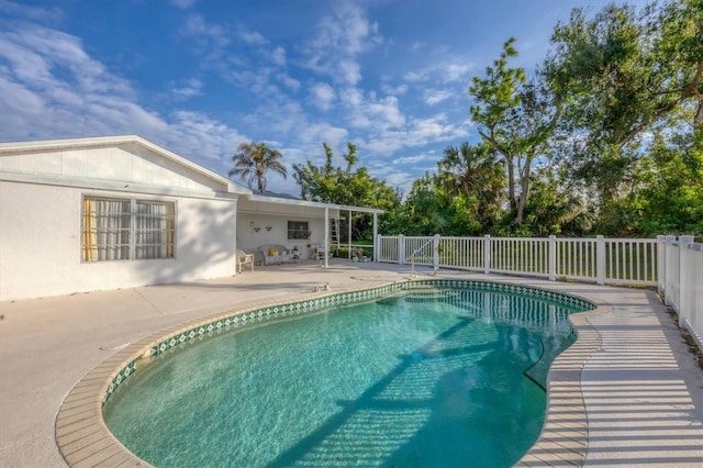 view of pool with a patio