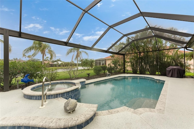 view of pool with a lanai, grilling area, an in ground hot tub, and a patio area