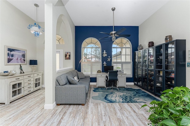 office space with ceiling fan and light hardwood / wood-style floors