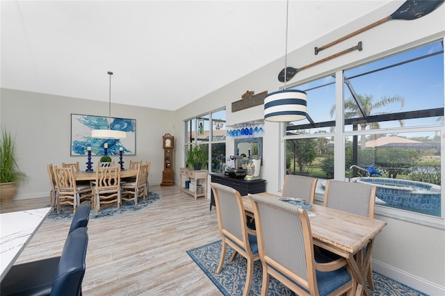 dining area with light wood-type flooring