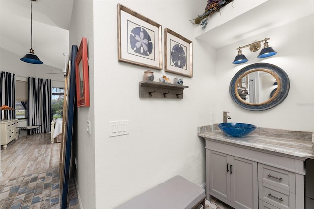 bathroom featuring vanity and ceiling fan