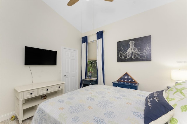 bedroom featuring ceiling fan and lofted ceiling