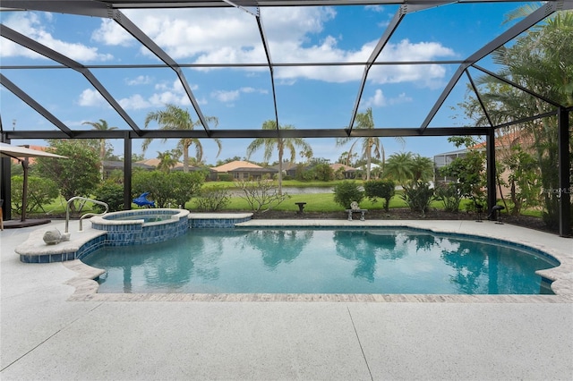 view of swimming pool with glass enclosure, a patio area, and an in ground hot tub