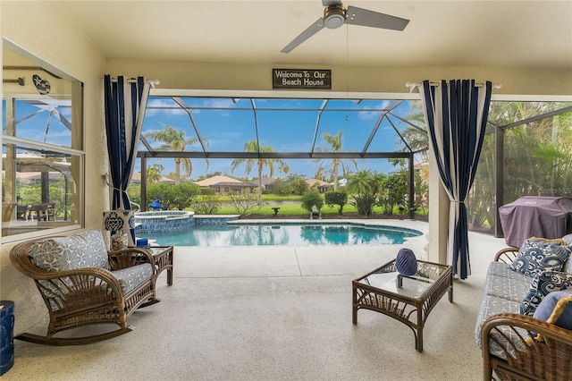 view of pool featuring glass enclosure, a patio area, an in ground hot tub, and grilling area