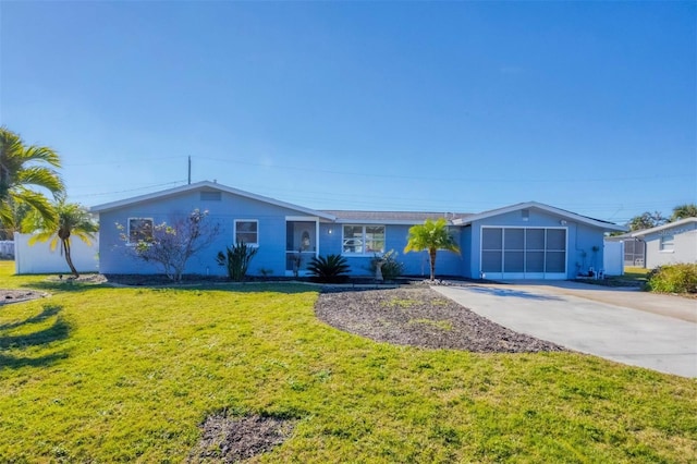 single story home with a front lawn and a garage