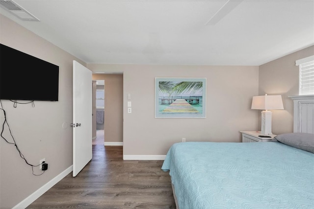 bedroom featuring hardwood / wood-style flooring