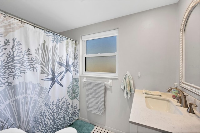 bathroom featuring toilet and sink