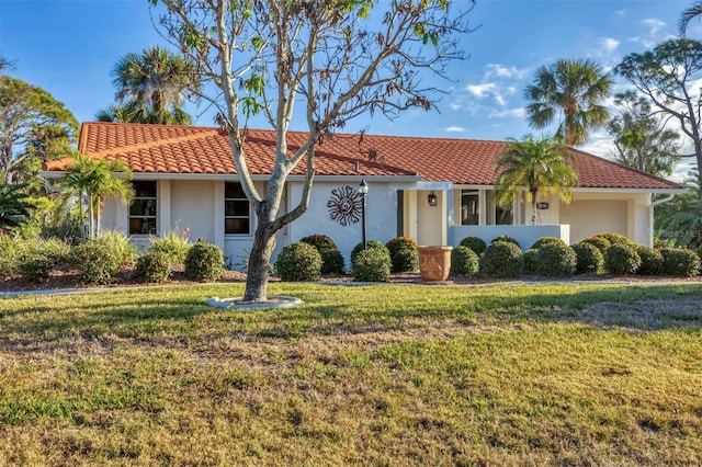 view of front facade with a front lawn