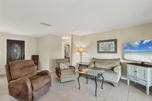 living room with light tile patterned floors