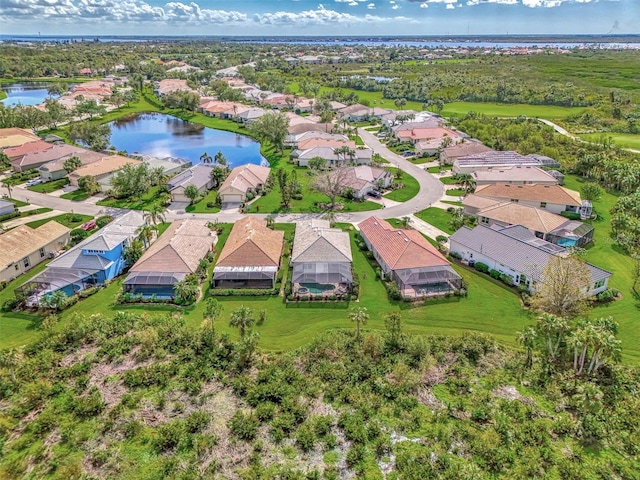 drone / aerial view with a water view