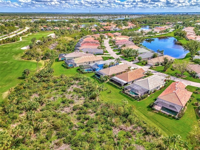 drone / aerial view with a water view