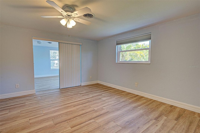 unfurnished room with ceiling fan and light hardwood / wood-style floors