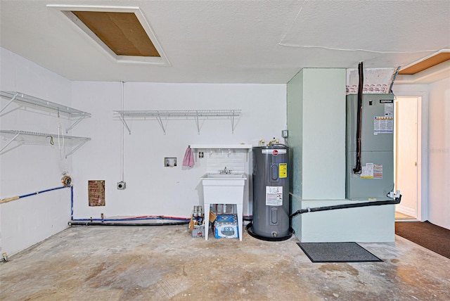 garage with heating unit and water heater