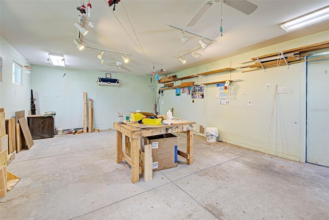 basement featuring a workshop area and ceiling fan