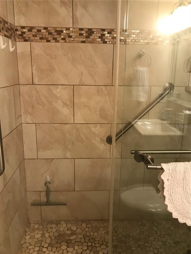 bathroom with an enclosed shower