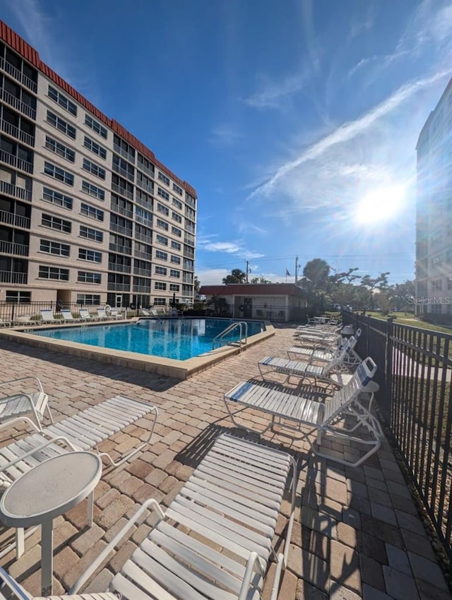 view of pool featuring a patio