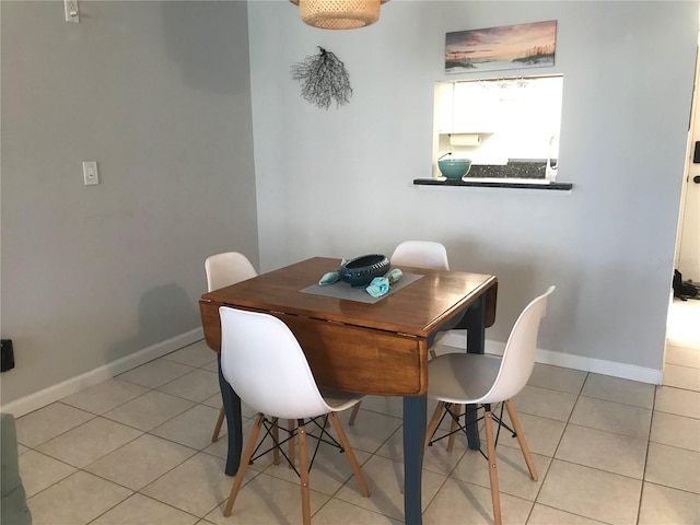 dining room featuring light tile patterned floors