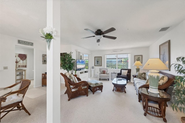 living room featuring ceiling fan