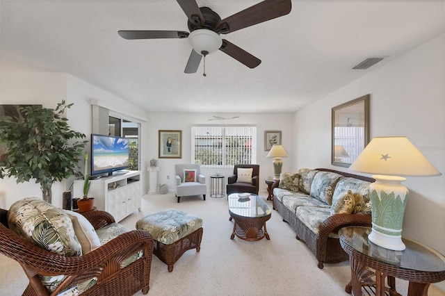 living room with ceiling fan