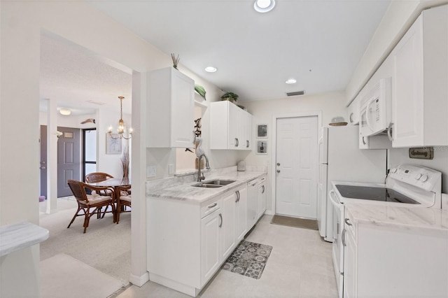 kitchen featuring sink, an inviting chandelier, light stone counters, white appliances, and white cabinets