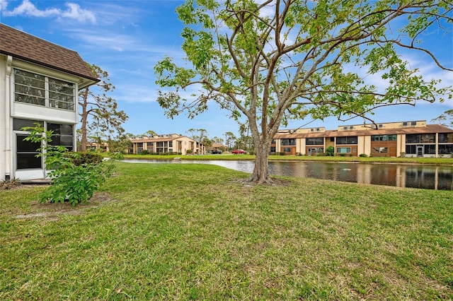 view of yard with a water view