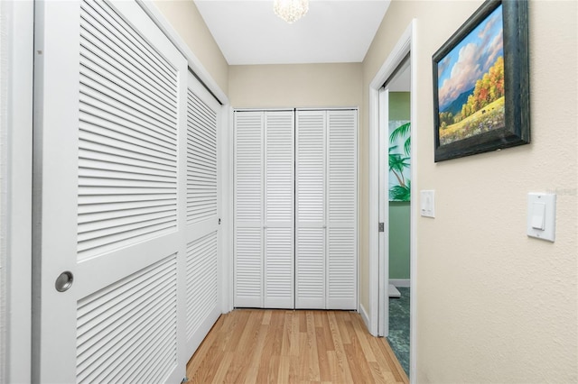 hall featuring light hardwood / wood-style flooring