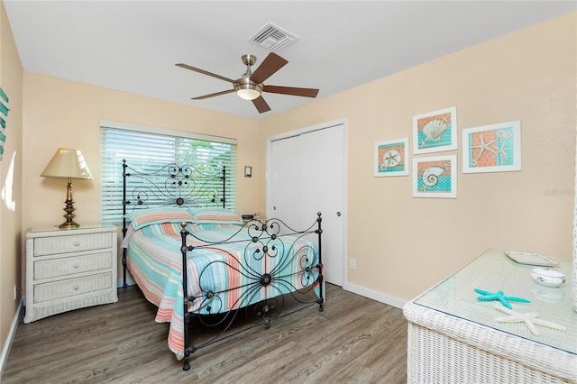 bedroom featuring ceiling fan and hardwood / wood-style floors