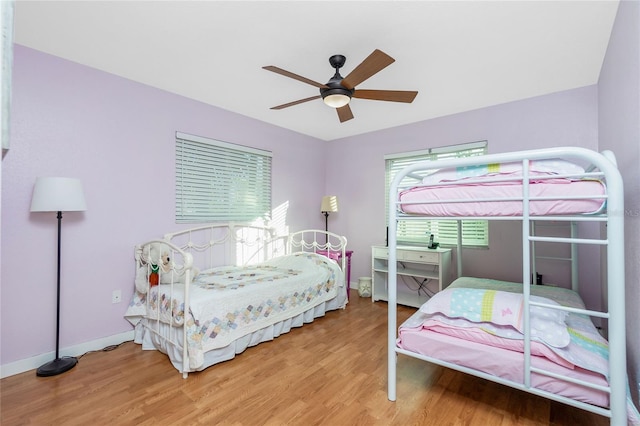 bedroom featuring ceiling fan and hardwood / wood-style floors