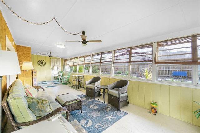 sunroom / solarium with ceiling fan