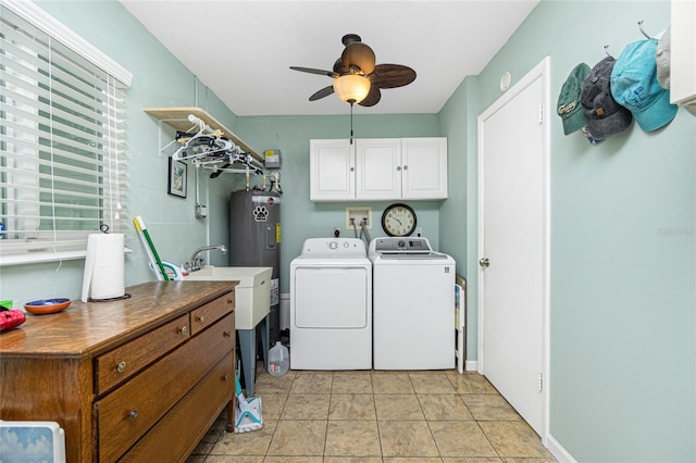 washroom with ceiling fan, light tile patterned flooring, cabinets, and independent washer and dryer