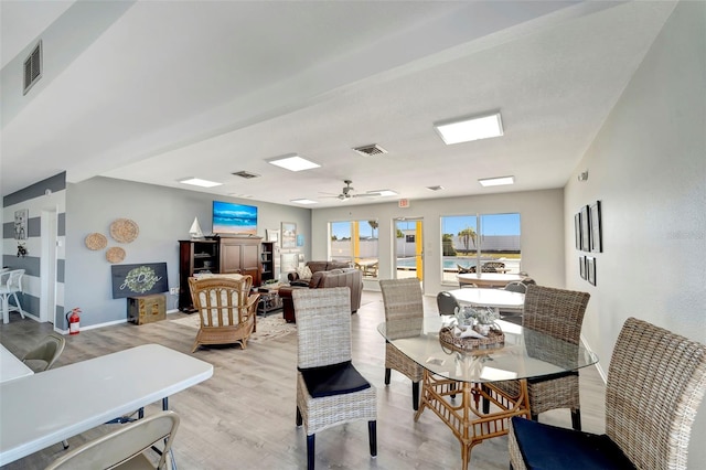 dining room featuring ceiling fan and light wood-type flooring