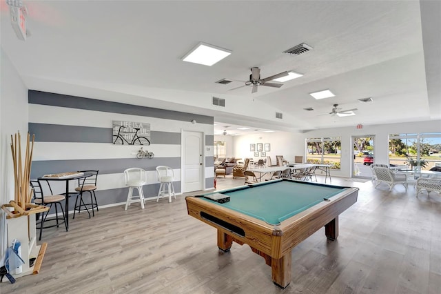 playroom featuring ceiling fan, light hardwood / wood-style floors, lofted ceiling, and pool table