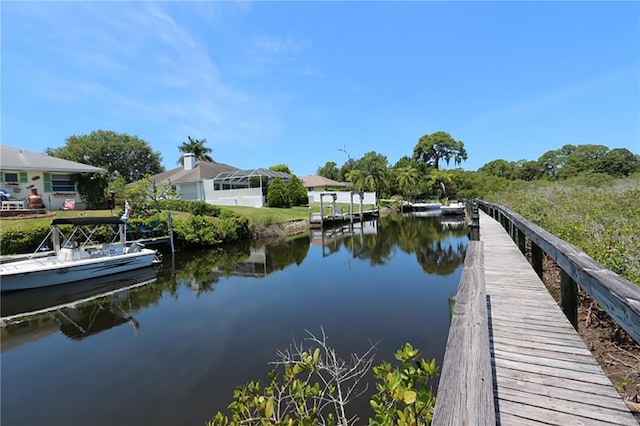 view of dock with a water view