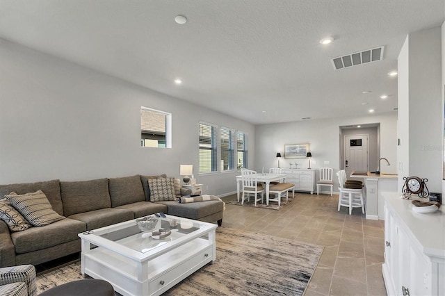 tiled living room with sink