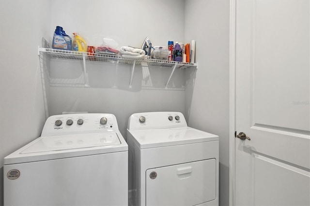 washroom featuring independent washer and dryer