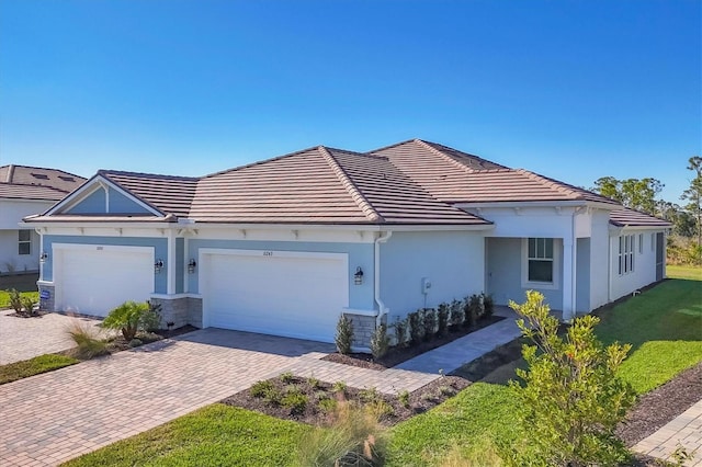 ranch-style home with a garage