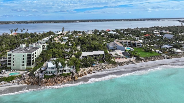 bird's eye view with a view of the beach and a water view