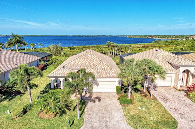 aerial view featuring a water view