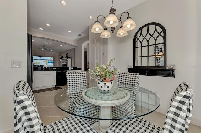 dining room featuring ceiling fan and light tile patterned floors