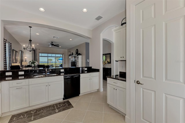 kitchen with pendant lighting, dishwasher, ceiling fan with notable chandelier, sink, and light tile patterned flooring