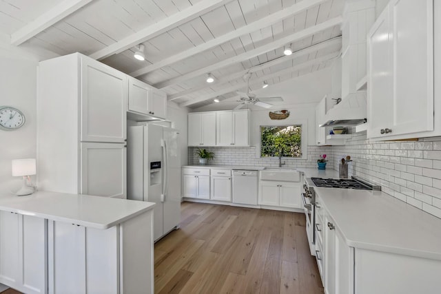 kitchen with white cabinetry, sink, backsplash, and white appliances