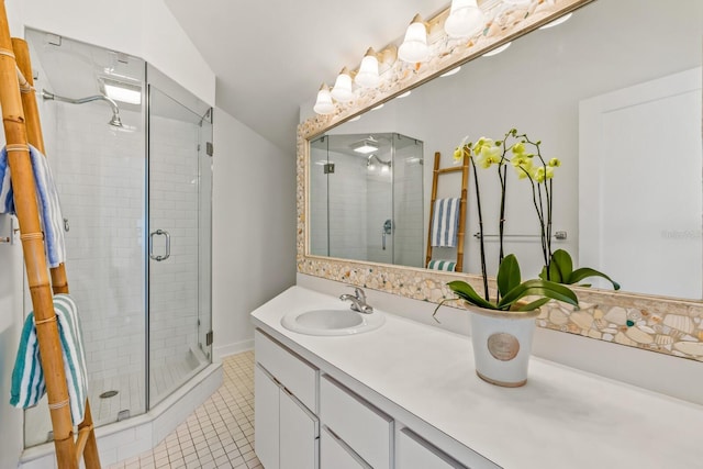 bathroom with vanity, tile patterned floors, vaulted ceiling, and a shower with door