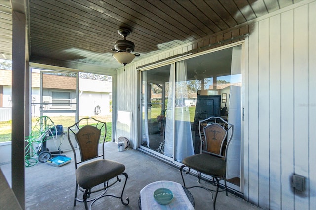 exterior space with ceiling fan