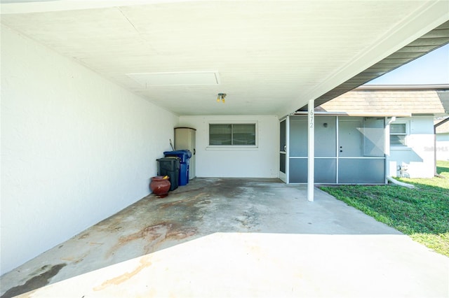 view of patio featuring a sunroom