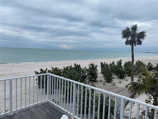 property view of water featuring a beach view