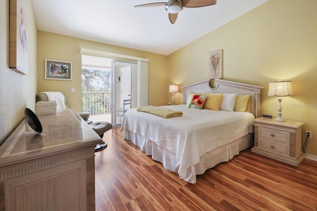 bedroom with ceiling fan, light hardwood / wood-style floors, and access to outside