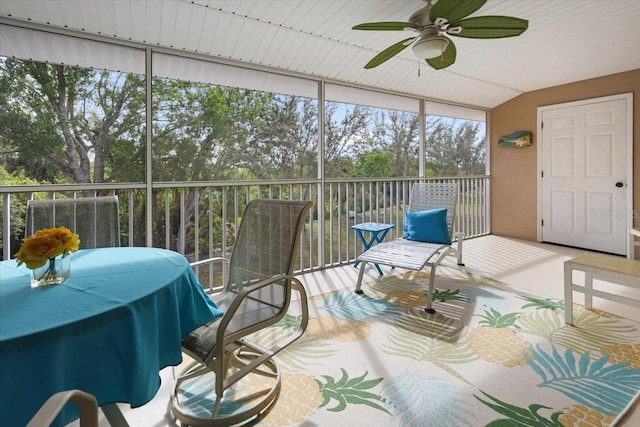 sunroom / solarium with ceiling fan and a healthy amount of sunlight