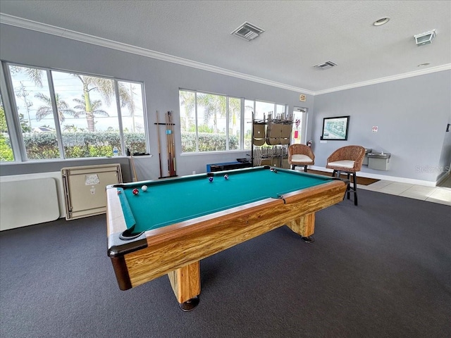 playroom featuring a textured ceiling, ornamental molding, and pool table