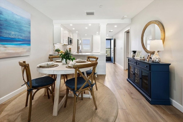 dining area featuring light hardwood / wood-style floors